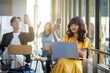 © shine - Group of Traveler fashion smiling people taking selfie photo looking at camera with toothy smile, recording self video, talking on online call and suitcases sitting in the waiting area of airport.