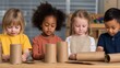 © vatcharapong - school recycling program. Children engaged in creative activities with cardboard tubes at a table.