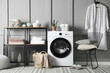 © New Africa - Laundry room with modern washing machine. Interior design