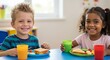 © El_design - Happy children enjoying lunch together at school table