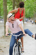 © auremar - man and woman on a bicycle