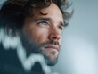 © SolaruS - Contemplative man looks towards the future. The blurry foreground suggests progress or uncertainty. Ideal for finance, investment, or business concepts. Serene yet focused.