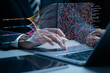 © Pakin - Big data technology and data science concept. Insights development engineer,  Analyst or scientist use laptop to analysis of information on complex data sets on virtual screen.