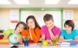 © BillionPhotos.com - Happy school children classmates study in classroom.