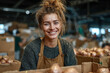 © Michael - Young woman worker apron smiling cheerful in a warehouse with onions