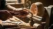 © ahsanulhaque - Skilled hands shape wood on a lathe creating shavings in a workshop