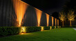 © Александр Марченко - Garden landscaping illuminating modern backyard fence at night