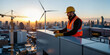 © MarGa - Focused male construction worker in safety gear strategizing building facade installation at sunset, urban skyline, construction and renewable energy concept