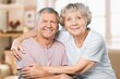 © BillionPhotos.com - Hug, love of senior couple relaxing together at home.