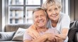 © BillionPhotos.com - Hug, love of senior couple relaxing together at home.