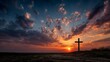 © Frame Stocks - cross silhouetted against the sunset sky