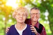 © BillionPhotos.com - Portrait of elderly people in a natural forest.