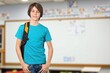 © BillionPhotos.com - Happy small student boy in school classroom