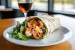 © Nakorn - Spicy seafood wrap delight cozy restaurant food photography warm light elevated viewpoint culinary experience