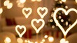 © Mostafizar - A glowing golden heart symbol of love and romance on a dark background for Valentine's Day decoration design