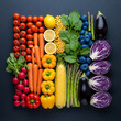 © ChristBastian - Overhead flat lay of fresh vegetables and fruits arranged in a rainbow gradient, eat the rainbow concept