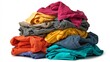 © Larysa - Vibrant stack of clothes on white background. AI image