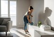 © akkml - Woman cleaning modern living room - Spring cleaning concept