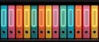 © ryker - Colorful office binders neatly arranged on shelf, vertical spines with label windows and ring holes, bright cyan orange yellow pink and teal tones creating organized modern workplace energy