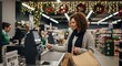 © Mila Shnobel - Woman Using Self-Checkout in Supermarket during Christmas Season