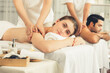 © InfiniteFlow - Caucasian couple customer enjoying relaxing anti-stress spa massage and pampering with beauty skin recreation leisure in day light ambient salon spa at luxury resort or hotel. Quiescent