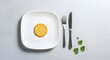 © Dorian Visuals - Single Cracker on White Plate with Cutlery on Minimal Gray Table