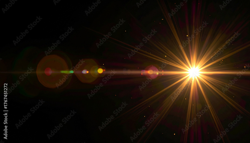 Bright Golden Starburst Lens Flare on Black Background Stock Photo ...