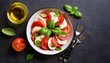 © Richard - classic caprese salad with fresh tomatoes mozzarella and basil italian food top view