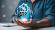 © MD BAYZID HASAN - Person holding holographic house with mortgage interest graph