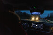 © Northern life - driver navigating rainy city roads, night journey with illuminated dashboard and tense urban