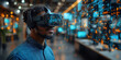 © liubovyashkir - Man using virtual reality goggles and pointing on some virtual button on grey background