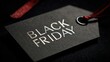 © Shoaib - Close-up of sale tag with Black Friday text on black background