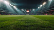 © HoneyStock - Empty soccer stadium at night with bright lights illuminating the field