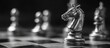 © noeryana - Close-up of a metal chess knight on a board, other pieces blurred in background