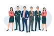© Fakhar - Group of business people standing together in suits and skirts with ties on