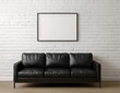 © Adam - A black leather sofa sits beneath a framed, empty rectangle on a white brick wall