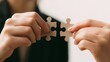 © LU - From the close-up of the seam of the jigsaw puzzle, it shows how two independent individuals become a whole. The concept of cooperation
