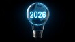 © Elena - Light bulb representing new ideas and innovations for the year 2026 with a global map design