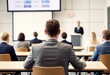 © Aliaksandr Barouski - Business professionals attending a presentation in a modern conference room