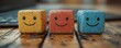© Georgii - Three colorful wooden blocks with smiling faces on a computer keyboard