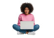 © salek - Young woman curly hair a laptop sitting crosslegged, isolated on transparent background