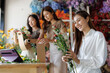 © crizzystudio - Florist team creating beautiful flower arrangements for online orders