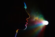 © VISTA by Westend61 - Colorful silhouette of woman in neon light projecting virtual reality