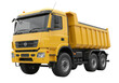 © Radovan - Isolated yellow dump truck viewed from low angle, a construction vehicle for heavy work and hauling