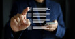 © chinnarach - close up businessman hand check online questionnaire survey from website to rate score and share aspect of audience after complete from seminar for business corporation concept