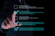 © bigjom - Businessman makes a checklist Assessment and questionnaire, online digital form check mark Choose the correct answer on the exam. Quality check