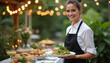 © Vadym - Smiling waitress serves delicious food at outdoor catering event. Woman in uniform holds plate with salad at wedding celebration party. Pro staff works at festive banquet providing excellent service.