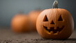 © A2Z AI  - A smiling jack-o'-lantern, with two triangle eyes and a toothy grin, casts a festive glow for the spooky season. Additional pumpkins sit softly blurred in the background.