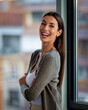 © gzorgz - Cropped shot of a brunette haired business woman standing confidently in a modern office