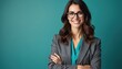 © Viktor - Smiling businesswoman with glasses poses. Confident lady in jacket arms crossed. Happy female wearing spectacles stands. Portrait of beautiful pro brunette woman.